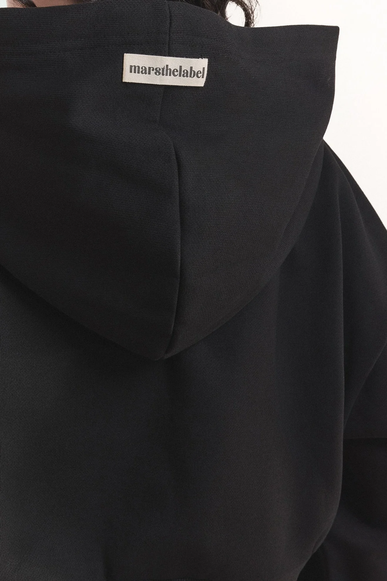 The Basic Crop Zip Hoodie in Black - Image 8