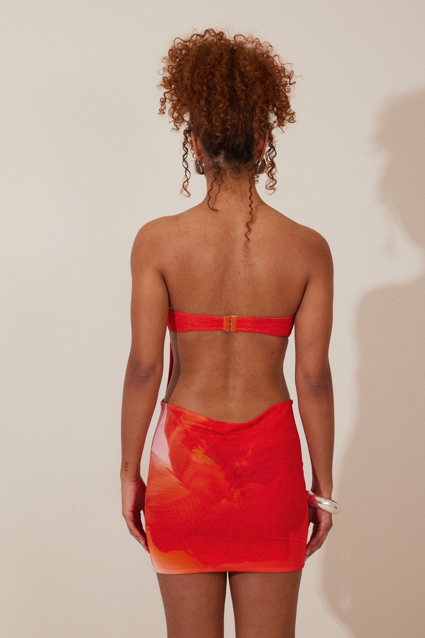 The Draped Mini Dress in Orange Print - Image 4