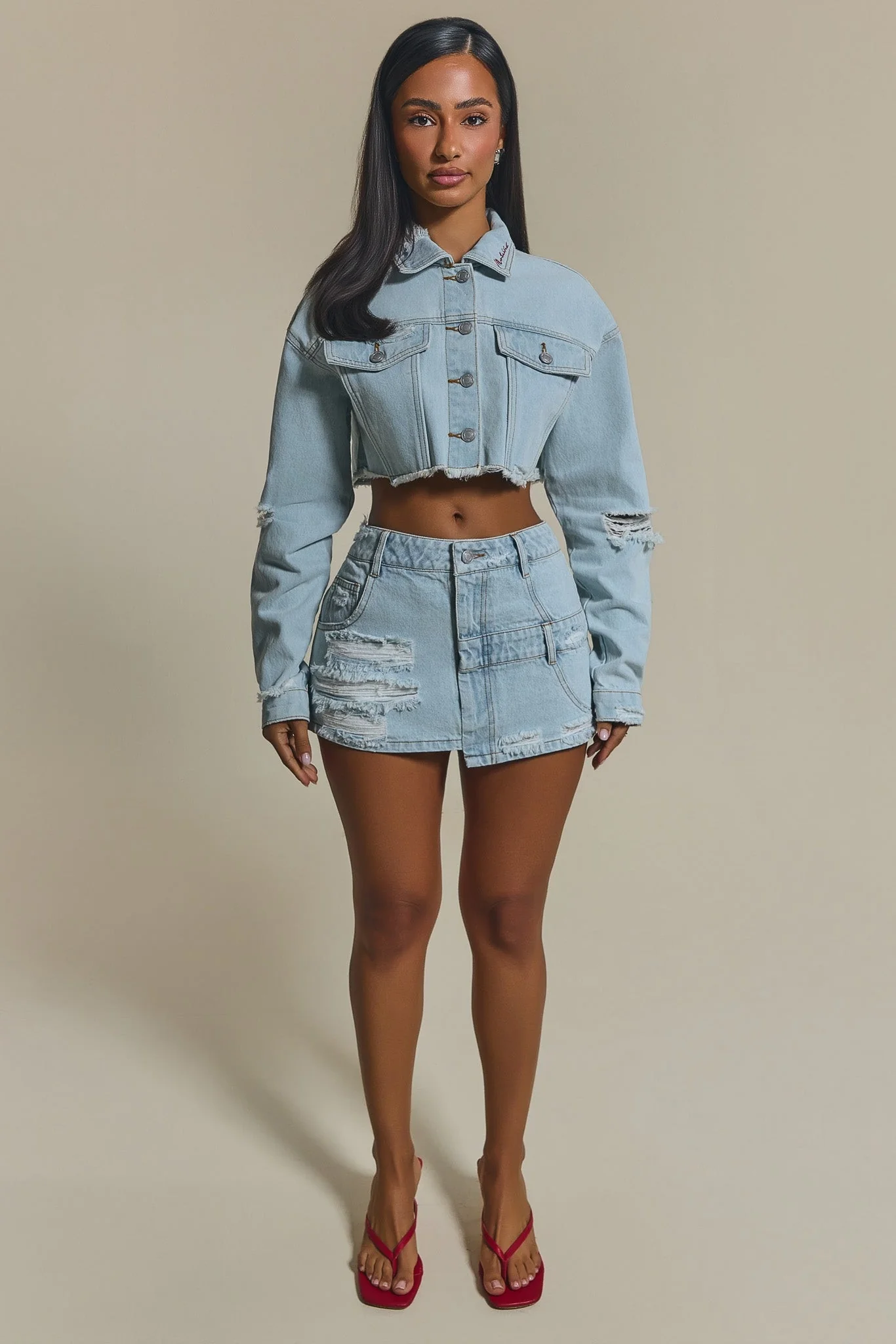 The Esha Denim Mini Skirt in Light Wash Blue - Image 2