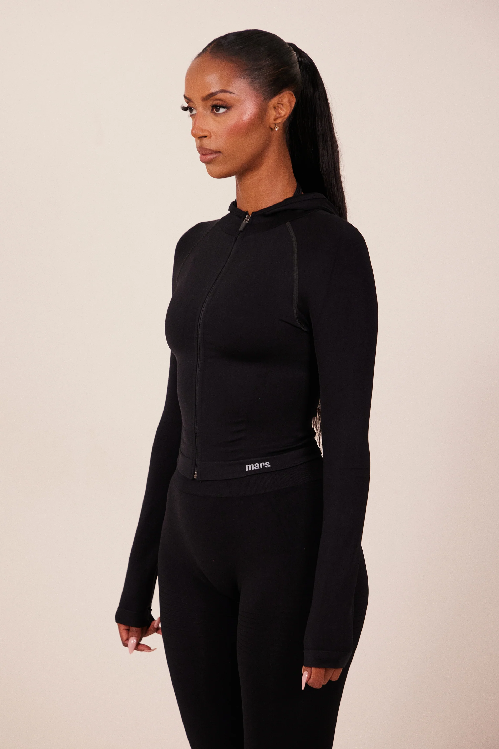 The Mars Seamless Hooded Zip Jacket in Black - Image 2