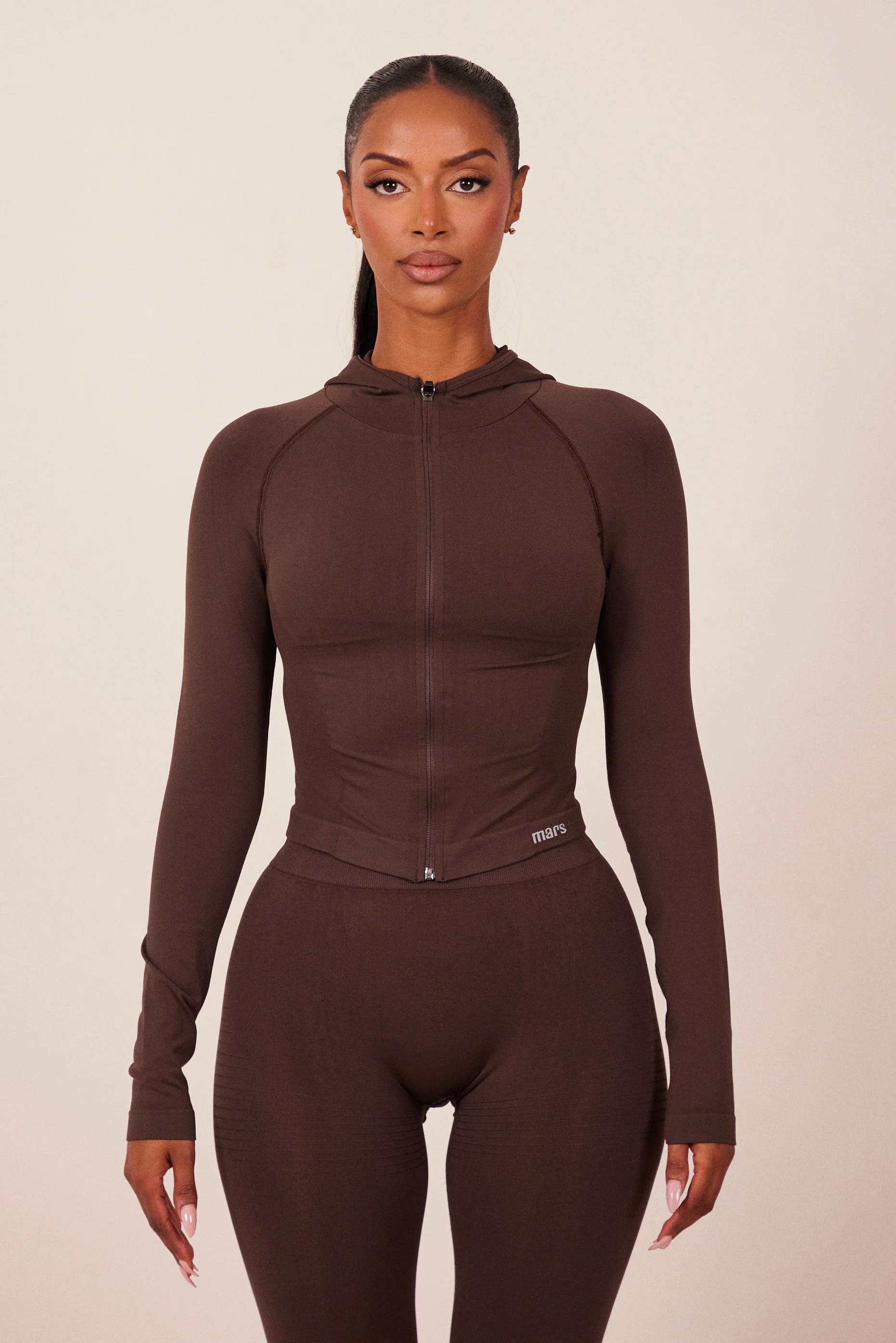 The Mars Seamless Hooded Zip Jacket in Brown