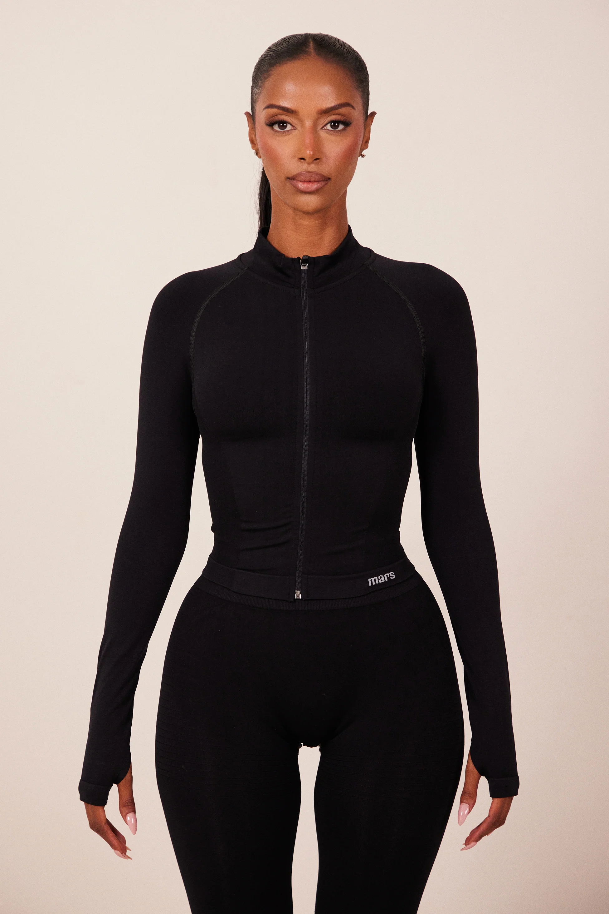 The Mars Seamless Zip Jacket in Black