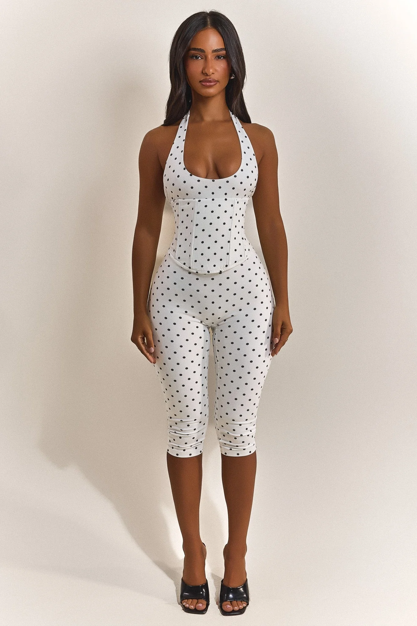 The Sandra Capri Jumpsuit in Polka Dot