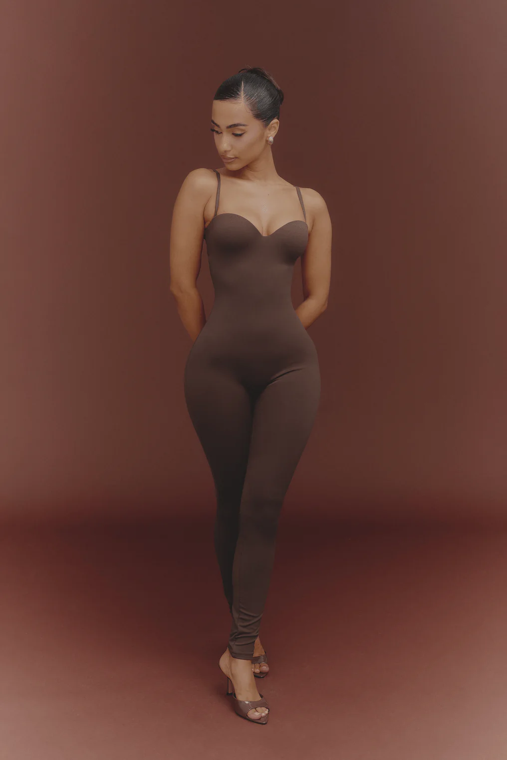 The Sculpt Jumpsuit in Brown - Image 9
