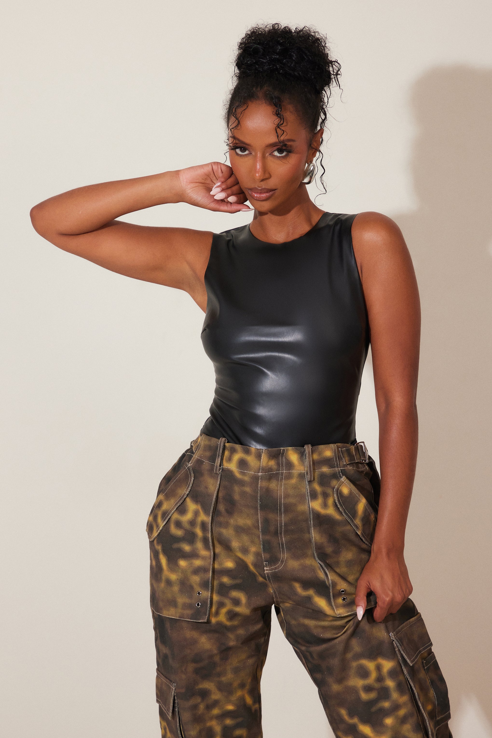 The Dominique Leather Bodysuit in Black - Image 6