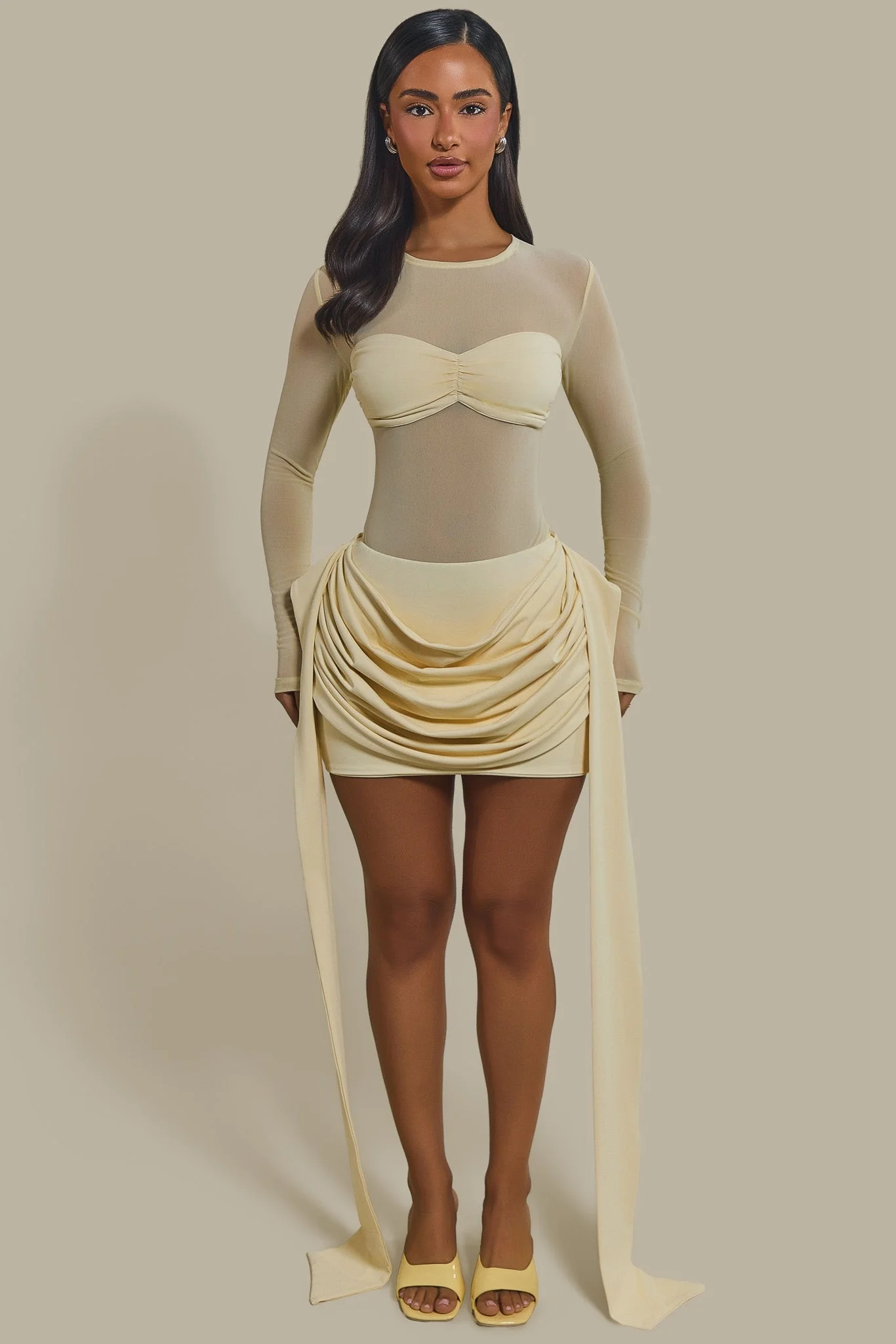 The Yara Long Sleeve Mesh Bodysuit in Butter Yellow